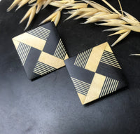 Quadrati origami a righe paglia e nero